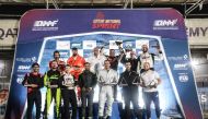 The podium winners pose for a group photo after the conclusion of fifth round of the Qatar National Sprint 2022 Championship.  