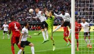Eintracht Frankfurt v Bayer Leverkusen -  Eintracht Frankfurt's Kristijan Jakic in action with Bayer Leverkusen's Lukas Hradecky during their German Bundesliga match at the Deutsche Bank Park in Frankfurt  on October 15, 2022.  REUTERS/Kai Pfaffenbach 