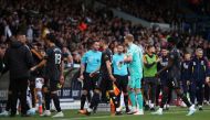 Players walk off the pitch as play is stopped due to technical problems during the EPL match between Leeds United and Arsenal at Elland Road, Leeds, Britain, on October 16, 2022.   Action Images via Reuters/Molly Darlington
