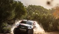 Qatar’s Nasser Saleh Al Attiyah and his French co-driver Mathieu Baumel in action yesterday.