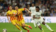 Girona's Arnau Martinez in action with Real Madrid's Vinicius Junior during their LaLiga match at the Santiago Bernabeu, Madrid, Spain, on October 30, 2022.  REUTERS/Isabel Infantes
