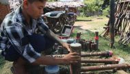 This screengrab from AFPTV video footage taken on October 15, 2022 shows members of the People Revolution Army (PRA) preparing homemade weapons in Pale township. (Photo by AFPTV / AFP)