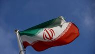 The Iranian flag waves in front of the International Atomic Energy Agency (IAEA) headquarters in Vienna, Austria, March 1, 2021. File Photo / Reuters