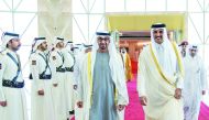 Amir H H Sheikh Tamim bin Hamad Al Thani welcoming President of the United Arab Emirates H H Sheikh Mohamed bin Zayed Al Nahyan in Doha yesterday.
