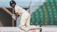 India's Cheteshwar Pujara plays a shot during the first day of the first cricket Test match between Bangladesh and India at the Zahur Ahmed Chowdhury Stadium in Chittagong on December 14, 2022. (Photo by Munir uz Zaman / AFP)