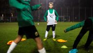 Ten-year-old Ukrainian refugee Danylo is seen during practice with his football club Rapid Wien in Vienna, Austria, November 15, 2022. REUTERS/Lisa Leutner
