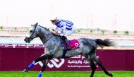 Jockey Lukas Delozier guides Amyr Du Soliel towards the finish line at Al Uqda Racecourse, yesterday. Pic: Juhaim