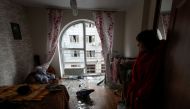 File Photo: Local resident Kateryna stands inside a room of her apartment damaged by a Russian drone strike, amid Russia's attack on Ukraine, in Kyiv, Ukraine December 30, 2022. REUTERS/Valentyn Ogirenko
