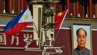 The national flags of the Philippines and China are seen together near the Tiananmen Gate as Philippine President Ferdinand Marcos Jr visits, in Beijing on January 3, 2023. (Photo by Noel Celis / AFP)