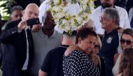 FIFA President Gianni Infantino poses for pictures during the wake of Brazilian football legend Pele at the Urbano Caldeira stadium in Santos, Sao Paulo, Brazil on January 2, 2023. Reuters/Diego Vara
