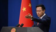 This file photo taken on April 8, 2020 shows Chinese Foreign Ministry spokesman Zhao Lijian taking a question at the daily media briefing in Beijing.  (Photo by Greg Baker / AFP)