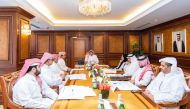 Minister of Labour H E Dr. Ali bin Smaikh Al Marri chairing a meeting of the Board of Directors of the Workers Support and Insurance Fund.