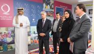 Minister of Social Development and Family H E Maryam bint Ali bin Nasser Al Misnad (second right) with other officials at the opening of the exhibition.