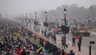 Spectators watch India's 74th Republic Day parade in New Delhi on January 26, 2023. (Photo by Money Sharma/ AFP)