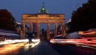 File photo of car traffic on a road in front of the illuminated Brandenburg Gate, in central Berlin, Germany, November 15, 2022. REUTERS/Lisi Niesner/File Photo