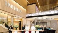 Qatar Airways Group Chief Executive H E Akbar Al Baker (centre), Hamad International Airport Chief Operating Officer, Eng Badr Al Meer (right) and TimeVallée CEO, Michael Guenoun during the ribbon cutting ceremony.
