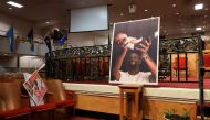 A view of a picture of Tyre Nichols during a news conference held by the family members of Nichols, the Black man who was beaten by Memphis police officers during a traffic stop and died three days later, at Mason Temple: Church of God in Christ World Headquarters, in Memphis, Tennessee, U.S., January 31, 2023. REUTERS/Alyssa Pointer