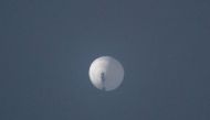 A balloon flies in the sky over Billings, Montana, U.S. February 1, 2023 in this picture obtained from social media. Chase Doak/via Reuters 