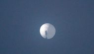 This handout photo from Chase Doak taken on February 1, 2023 and released on February 2 shows a suspected Chinese spy balloon in the sky over Billings, Montana. (Photo by Chase DOAK / CHASE DOAK / AFP)