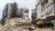 People search for survivors under the rubble, following an earthquake, in Aleppo, Syria on February 6, 2023. REUTERS/Firas Makdesi