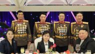 This picture taken on February 7, 2023 and released from North Korea's official Korean Central News Agency (KCNA) on February 8, 2023 shows North Korean leader Kim Jong Un attending a banquet to mark the 75th anniversary of the Korean People's Army (KPA), with his wife Ri Sol-Ju (left) and his daughter (centre) in North Korea. (Photo by KCNA VIA KNS / AFP)