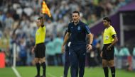 Argentina's coach Lionel Scaloni reacts on the touchline during the Qatar 2022 World Cup semi-final match between Argentina and Croatia at Lusail Stadium in Lusail, north of Doha on December 13, 2022. File photo/ AFP

