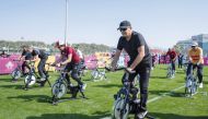 Speaker of the Shura Council H E Hassan bin Abdullah Al Ghanim participates in a Sport Day activity. 