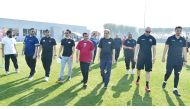 Dr. Hassan Al Derham, President of Qatar University, and Dr. Khalid Al Khater, Vice President of Administration and Financial Affairs, touring the area with other officials.