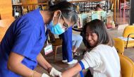 A health check-up being done on an employee.