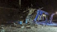 This handout picture released by Panama Chiriqui's Firefighters shows the aftermath of a bus transporting migrant people crashed, causing 39 deaths in Gualaca, Panama on February 15, 2023. (Photo by Panama Chiriqui's Firefighters / AFP)