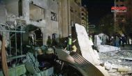 A handout picture taken and released on February 19, 2023 by the official Syrian Arab News Agency (SANA) shows a damaged building following an Israeli missile strike.