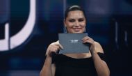 Brazilian model Adriana Lima stands on stage during the Best FIFA Football Awards 2022 ceremony in Paris on February 27, 2023. (Photo by FRANCK FIFE / AFP)