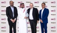 Sheikh Abdulla Bin Khalid Nasser Hamad Al Thani (second from left) receives the award from Mourad Alem (second from right) in the presence of Pradeesh Kumar, General Manager - KBN Group Holding (left) and Rajesh Balachandran, Regional Sales Manager, Whirlpool Corporation - Middle East (right).