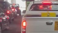 File photo: Vehicle with the radioactive warning symbol sticker in traffic.