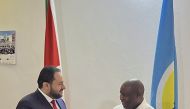 President of Burundi H E Evariste Ndayishimiye with Assistant Foreign Minister for Regional Affairs H E Dr. Mohammed bin Abdulaziz bin Salih Al Khulaifi, in Bujumbura, yesterday.
