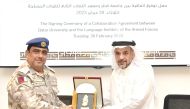 QU Vice-President for Academic Affairs Dr. Omar Al Ansari and Director of the Languages Institute Brigadier General (Pilot) Hassan Abdullah Ahmed Al Abdullah during the ceremony.