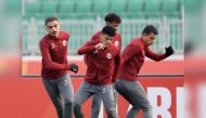 Qatar players during a training session yesterday.