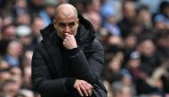 Manchester City's manager Pep Guardiola looks on during the English Premier League match between Manchester City and Newcastle United at the Etihad Stadium in Manchester, north west England, on March 4, 2023. (Photo by Paul ELLIS / AFP)