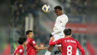 Action during the match between Qatar and Vietnam yesterday.