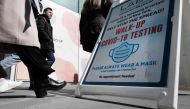 A sign for a Covid-19 testing tent sits along a Manhattan street on March 09, 2023 in New York City. (Photo by Spencer Platt / Getty Images via AFP)
