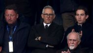 Gary Lineker (C), former England footballer turned sports TV presenter for the BBC, reacts as he waits in the stands ahead of kick-off in the English Premier League football match between Leicester City and Chelsea at King Power Stadium in Leicester, central England on March 11, 2023. (Photo by DARREN STAPLES / AFP)