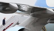 US President Joe Biden boards Air Force One on March 13, 2023 at Joint Base Andrews in Maryland. (Photo by Saul Loeb / AFP)
