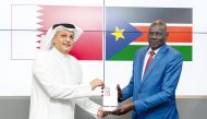 Minister of Communications and Information Technology H E Mohammed bin Ali Al Mannai with Minister of Communications and Information Technology and Postal Services of South Sudan H E Michael Makuei Lueth. 