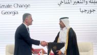 Minister of Environment and Climate Change H E Sheikh Dr. Faleh bin Nasser bin Ahmed bin Ali Al Thani and Minister of Environmental Protection and Agriculture of Georgia H E Otar Shamugia exchanging documents after signing the agreement.