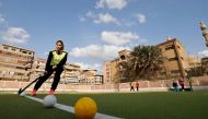 Egyptian female field hockey players attend a training session in al-Zagzig city, at Sharqiya governorate, northeast of Cairo, on March 6, 2023. (Photo by Khaled Desouki 
/ AFP)