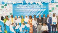 Fatoumatta Bah Barrow, First Lady of the Gambia; Claudiana Ayo Cole, Gambia’s Minister of Basic and Secondary Education; Dr. Mary Joy Pigozzi, Executive Director of EAA’s Educate A Child programme; Dr. Shahid Mahbub Awan, UNICEF Gambia Acting Representative; and students at the launch event. 