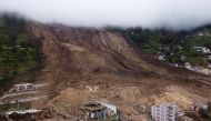 Aerial view following a landslide in Alausi, Ecuador on March 27, 2023. Photo by Marcos PIN / AFP
