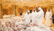 Katara General Manager, Prof. Dr. Khalid bin Ibrahim Al Sulaiti, and other officials check the 'Saftan Katara' Ramadan baskets. The initiative aims to help the poor and those in need. 