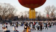 File Photo: People enjoy an ice rink on a frozen lake, amid the COVID-19 outbreak in Beijing, China December 31, 2022. (REUTERS/Florence Lo)