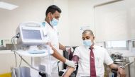 A Mowasalat (Karwa) employee undergoing a medical test during the campaign. 